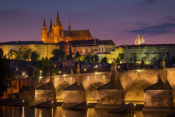 Fototapeta premium View of the castle and Charles bridge in Prague after the sunset, Czech Republic