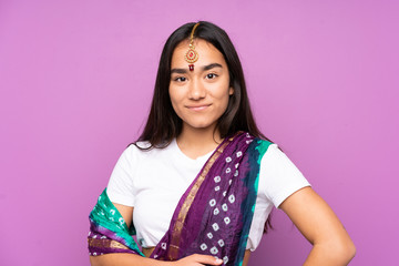 Young Indian woman with sari over isolated background