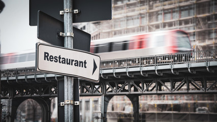 Street Sign to Restaurant