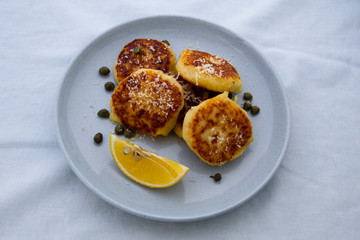 Potato Parmesan Pancakes with lemon and capers