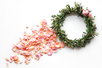 Flower wreath and petals showing natural fertilization process in creative way.