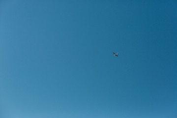 an airplane flying far in sky