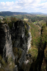 Fototapeta na wymiar Valley view from the Bastei bridge in the Saxon Switzerland National Park