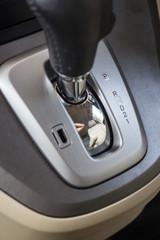 Automatic gear stick inside modern sport car. 