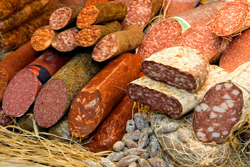Different types of sausages as background.