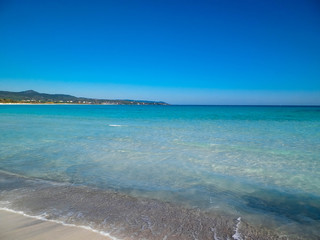 Blue water of Tyrrhenian sea in Vada, Tuscany, Italy.