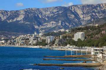 Fototapeta na wymiar View of the Yalta coast from the sea during the day
