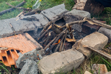 Fototapeta na wymiar Fireplace for improvised barbecue