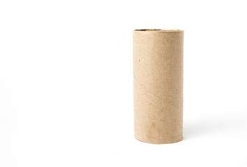 Image of cardboard toilet paper roll shot on white background in a studio with professional lighting for ecommerce. global pandemic people stacking up on toilet roll bulk buying and running out