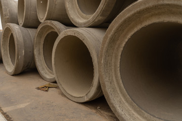 Concrete drainage pipes for industrial building construction.