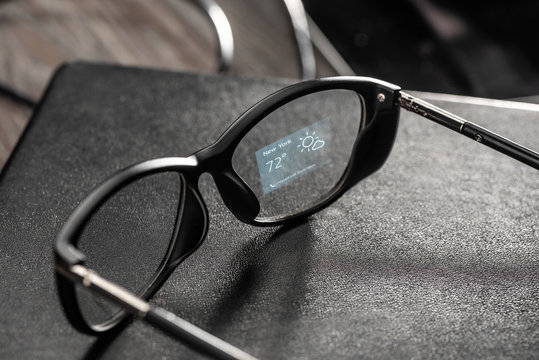 Weather app projected onto a lens of smart glasses