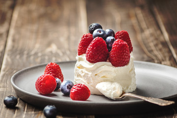 cheese cake with raspberries and blueberries