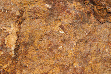 Brown golden stone rough detailed macro texture