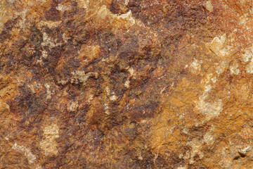 Brown golden stone rough texture
