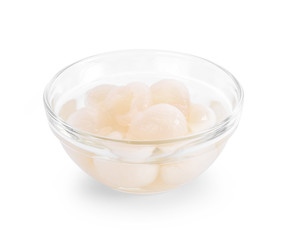 Longan syrup in glass on white background.