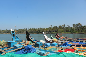 colourful boats in back waters kerala india