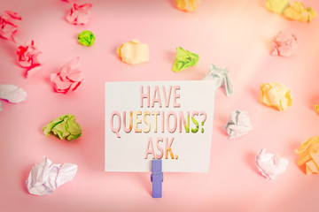 Word writing text Have Questionsquestion Ask. Business photo showcasing something that you say or write to ask an individual Colored crumpled papers empty reminder pink floor background clothespin