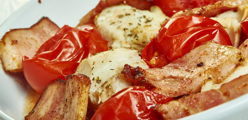 Cod with chopped tomatoes,  crispy pancetta,