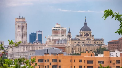 Fototapeten MADRID, SPAIN - APRIL 20, 2020: SKYLINE OF MADRID WITHOUT CONTAMINATION DURING COVID-19. ROYAL PALACE, SPAIN SQUARE BUILDING, TOWER MADRID AND FINANCIAL DISTRICT TOWERS © showbroadcaster