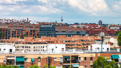 Fototapeta na wymiar MADRID, SPAIN - OCTOBER 08, 2019: PANORAMIC VIEW OF PART OF MADRID WITH ITS COMMUNICATION TOWER IN THE BACKGROUND 