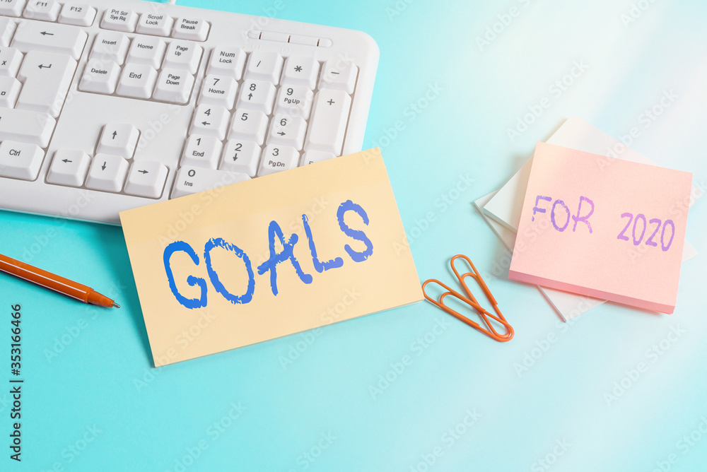 Poster writing note showing goals for 2020. business concept for object of an individuals ambition or effor