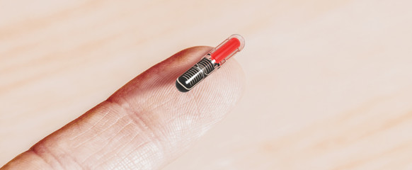 Microchip to implant in humans