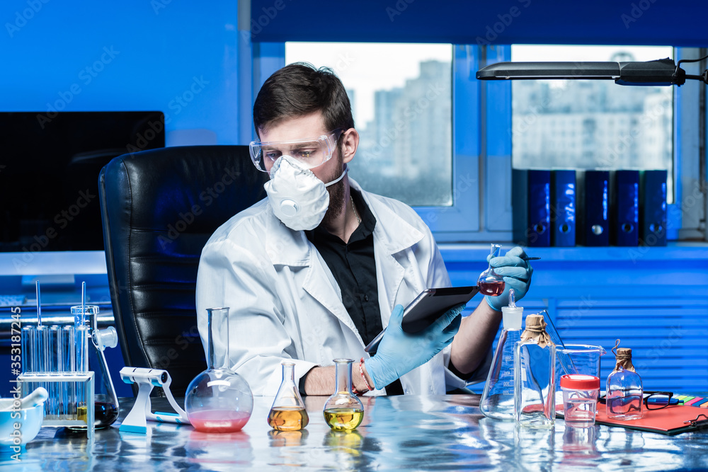Poster man works as a laboratory assistant. laboratory assistant with t