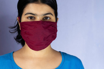 indian woman wearing nose mask