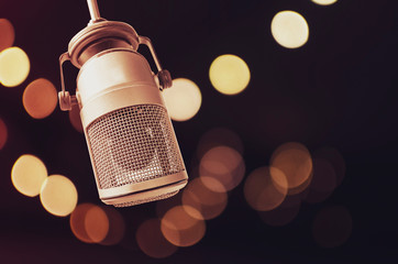 For radio stations and podcaster: background with professional microphone