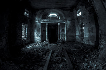 Fototapeta na wymiar Mystical interior of an old abandoned church