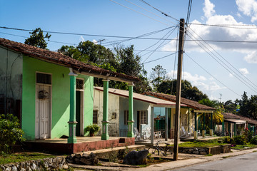 Fototapeta na wymiar Colourful pretty houses along the main road, Vinales, Cuba