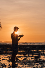 Tourist with a drone control at Railay beach, Thailand