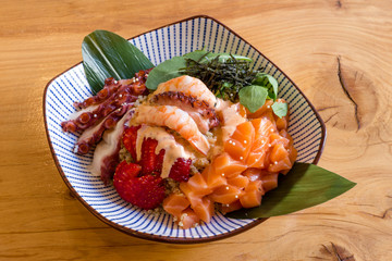 POKE OCTOPUS. SALMON AND STRAWBERRIES