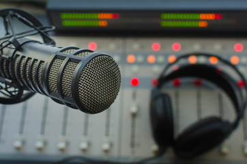 Professional microphone and sound mixer in radio station studio