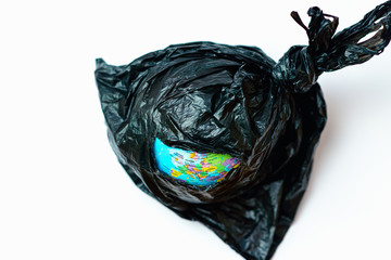 World Globe inside plastic bag you can see in hole different parts of the world.Ozone depletion in atmosphere concept.