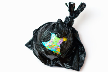 World Globe inside plastic bag you can see in hole different parts of the world.Ozone depletion in atmosphere concept.