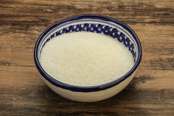 White sugar in the bowl