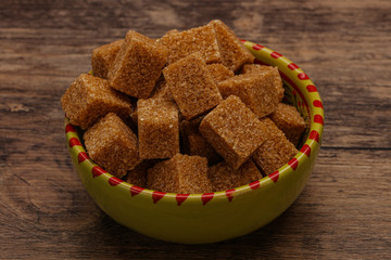 Cane sugar cubs in the bowl
