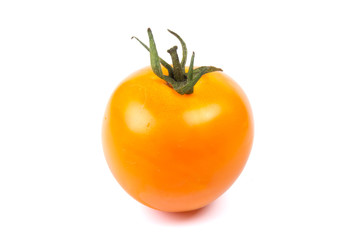 Yellow fresh tomatoes  isolated on white background in close-up