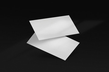 White minimal business card mockup on black background. PSD file.