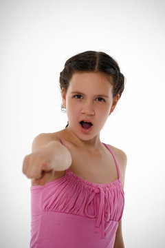 girl in pink accuses showing a finger