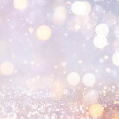 Obraz premium Christmas light background. Holiday glowing backdrop. Defocused Background With Blinking Stars. Blurred Bokeh.