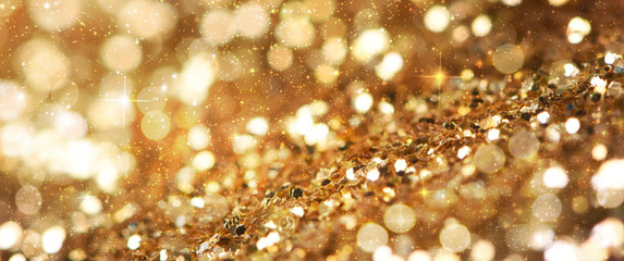 Christmas light background.  Holiday glowing backdrop. Defocused Background With Blinking Stars. Blurred Bokeh.