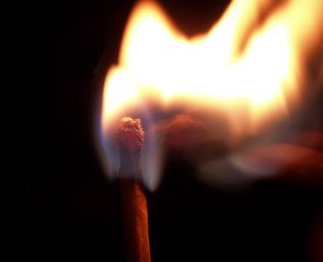 Ignition of match close-up detail
