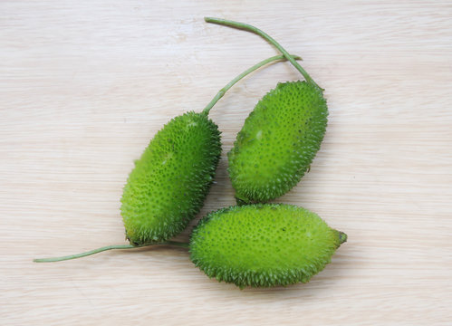 Spiny gourd or spine gourd and also known as bristly balsam pear, prickly carolaho, teasle gourd, kantola. It is used as a vegetable in India and South Asia. Scientific name - Momordica dioica. 