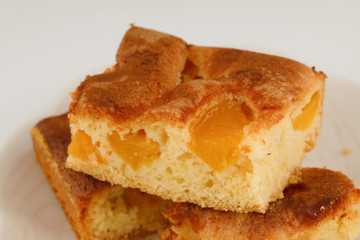 Several pieces of peach pie