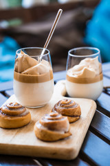Delicious Daytona coffee with homemade cinnamon rolls on a coffee shop