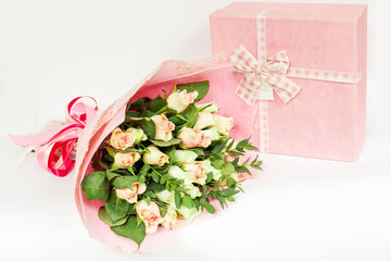 bouquet of flowers and box on a white background