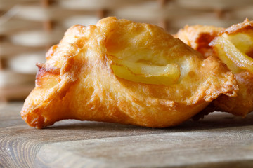 Fried irregularly shaped doughnuts