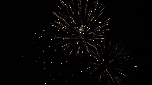 Real Fireworks footage 4k video on Deep Black Background Sky